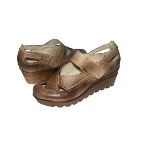 Beige ladies' sandals with a wedge-shaped heel and decorations